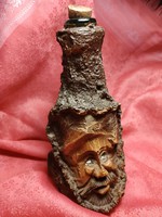 Interesting decorative glass with a wooden head