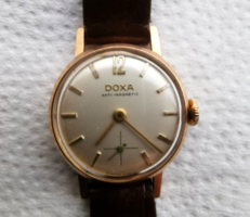 14 carat gold case doxa watch with leather strap in good working condition