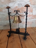Hotel, receptionist, valet calling copper bell wrought iron