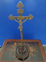 Antique copper cross on wooden base