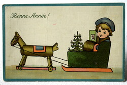 Antik dombornyomott Újévi üdvözlő grafikus képeslap  kisfiú szán fa ló  fenyő