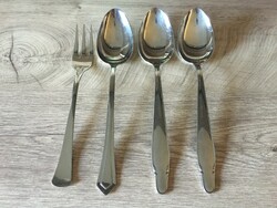 Old serving spoons and fork in one