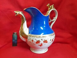 Old gilded figural porcelain spout and jug.