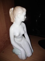 Porcelain sitting girl figure for sale