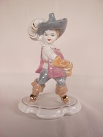 Porcelain boy in musketeer costume