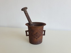 Old vintage big cast iron mortar with pestle