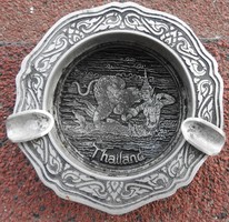Antique Thai metal ashtray with mythical scene