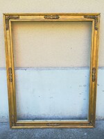 Beautiful wooden picture frame. Nest: 80x60 cm. Color: gold, antique.