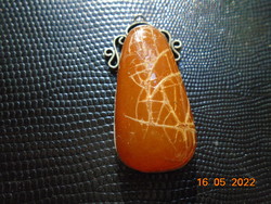 Antique amber pendant in alpaca socket with filigree alpaca fitting