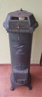 Antique royal 400 chamotte stove with eagle decoration