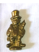 Little boy with a brass hat, copper ornament, copper figure