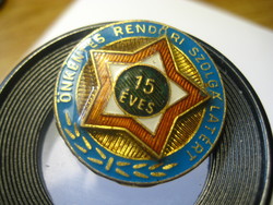 25 mm for 15 years of voluntary police service