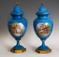 Pair of blue porcelain vases with baroque scene