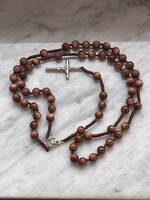 Special sunstone rosary knotted precious piece.