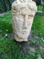 Limestone sculpture head from excavation