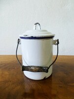 Old tin milk jug
