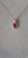 Ruby stone heart shaped silver pendant on silver chain