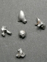 Campo del cielo version iron meteorites from Argentina. 5 Tiny grains advertised together 1.7 grams.