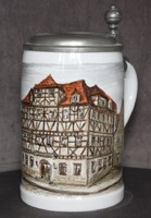 There are 250 Lions international club limited glazed ceramic beer mugs with tin lids in the world.
