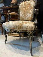 French rococo chair with armrests