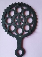 Old cast iron dish washer with star motif