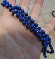 Old blue plastic pearl necklace