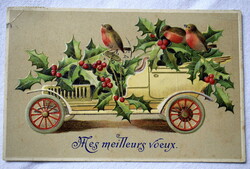 Antique embossed greeting postcard with automobile birds holly