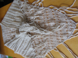 Beige knitted scarf