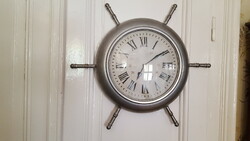 Rudder-shaped, aluminum wall clock 61 cm.