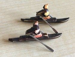 Bakelite badge - rowers - carved in the 1930s and 1940s - with a nickel paddle.