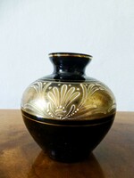 Black glass vase painted with gold