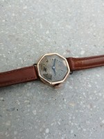 Small Swiss gold watch, no minimum price.