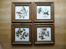 Picture of 4 birds on a tiled wooden frame