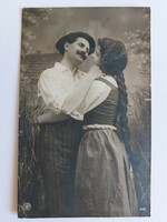 Romantic couple with old postcard photo postcard