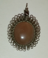 Handmade pendant with natural brown moonstone.