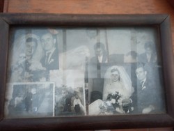 Old photos in a glazed wooden frame