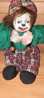 A clown with an old porcelain head