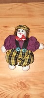 A clown with an old porcelain head