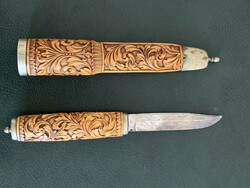 Knife with hand-carved handle and sheath