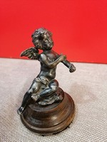 Silver-plated pewter, figural statue, with wooden pedestal. 10 cm high.