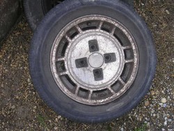 4 Alloy rims for old time cars are mitsu. It has 185 / 65 r 14 tires for Nissan