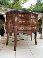 Beautiful graceful chest of drawers with marble top