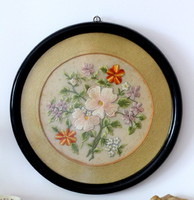 Beautiful antique tulle embroidery in a frame, wall picture
