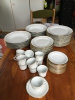 Gold-rimmed dinnerware, 12-person, Chinese, circa 1990