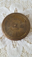 Antique copper nautical 100-year-old perpetual calendar with compass