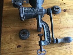 Antique meat grinder with accessories for making cakes
