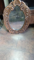 Antique oval mirror.