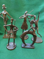 Iparművészeti bronz figura Bőröndös nő