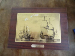 On an engraved copper plate, sailing ships with the inscription regelschift anno 1647 on a wall glued to damaged and worn wood