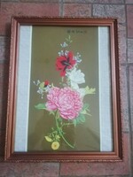 Chinese print in a decorative wooden frame